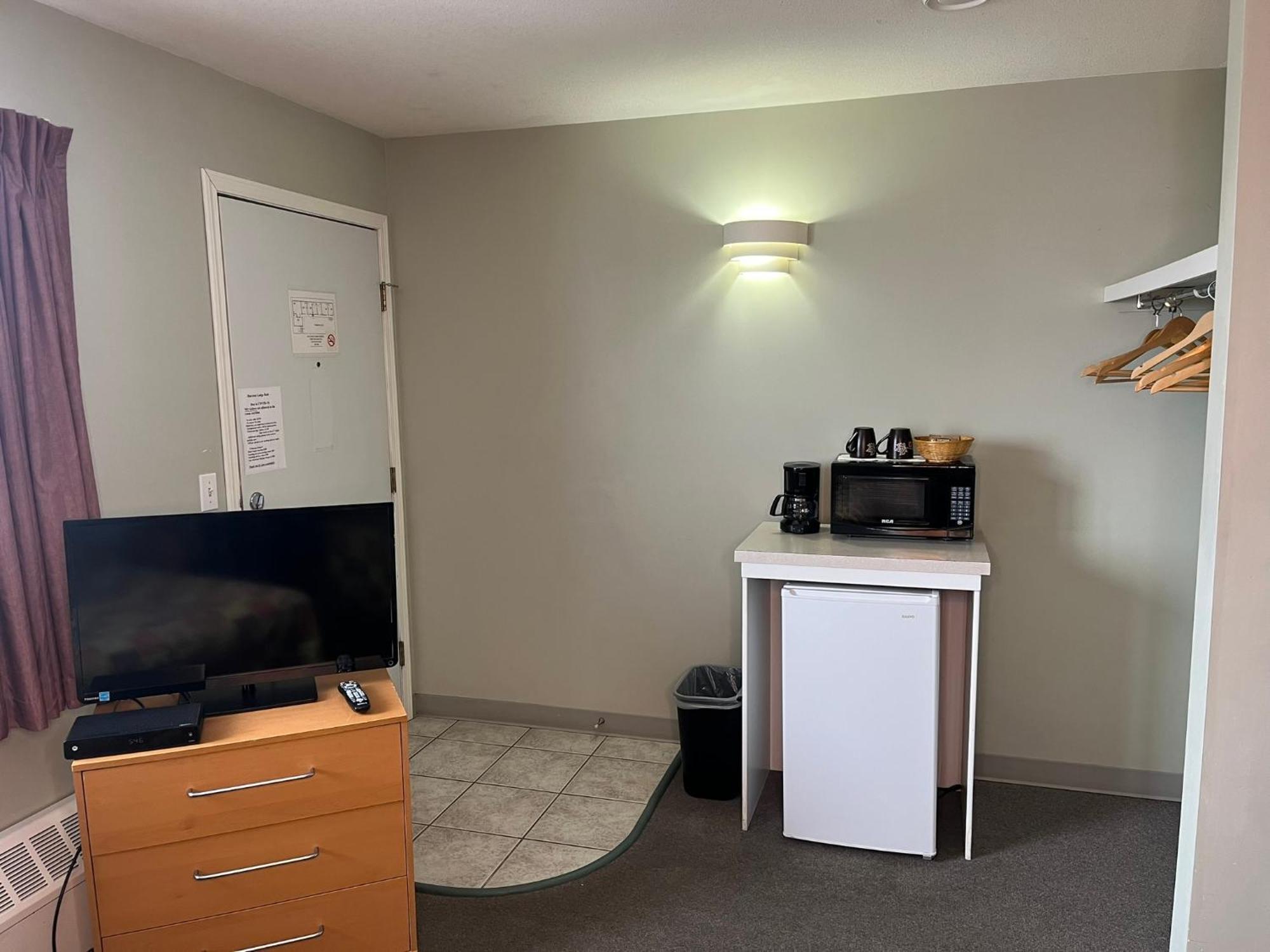 Raccoon Lodge Motel Sylvan Lake Zimmer foto